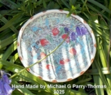Handcrafted pottery that has been thrown on the wheel and adorned with a variety of decorative techniques by Michael G Parry-Thomas, specifically designed and created for the enjoyment of his friends and family.